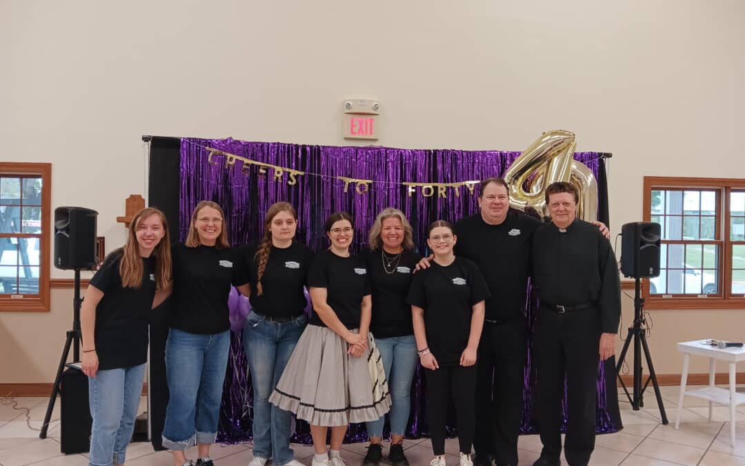 Cheers for 40 years: Parishioners surprise Fr. Terry Devine